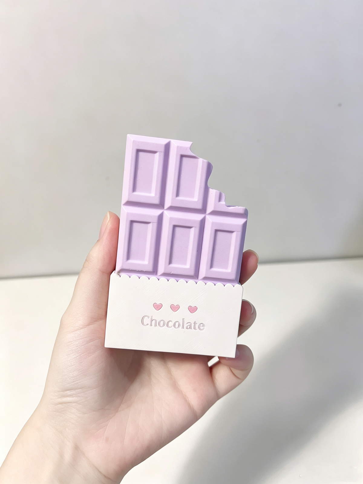 Lavender chocolate bar card holder with a white wrapper